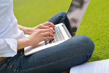 Image showing woman with laptop in park