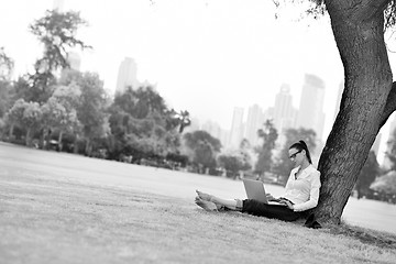 Image showing woman with laptop in park