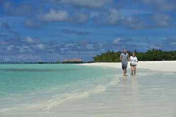 Image showing happy young  couple at summer vacation have fun and relax at bea