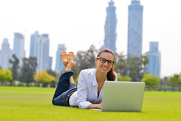 Image showing woman with laptop in park