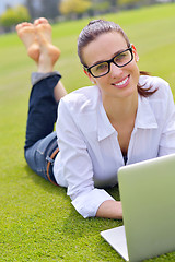 Image showing woman with laptop in park