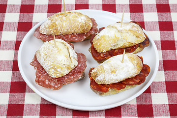 Image showing Sausage sandwich, typical Basque cap.