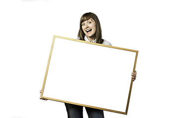 Image showing Happy young girl with blank whiteboard