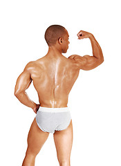 Image showing Showing his biceps.