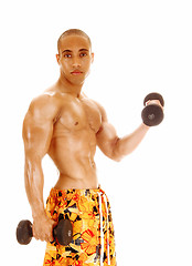 Image showing Guy holding dumbbell.