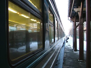 Image showing passanger getting on a train