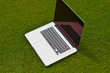 Image showing laptop computer  on grass