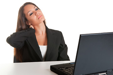 Image showing Businesswoman Sitting at Her Desk Tired