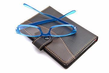 Image showing Notebook and Glasses