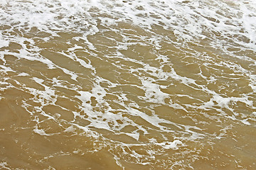 Image showing Foamy seawater surface after the storm