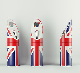 Image showing Eco fuel: three charging stations with Union Jack flag pattern