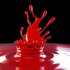 Image showing Splash of red colorful liquid with crown