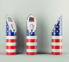 Image showing Eco fuel: three charging stations with USA flag pattern