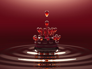 Image showing Splash of red colorful liquid or wine with droplets