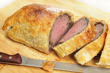 Image showing Beef wellington sliced with knife