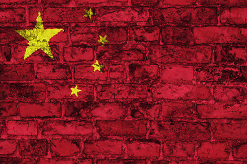 Image showing Chinese flag on brick wall
