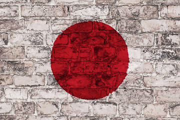 Image showing Japanese flag on brick wall