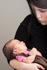 Image showing Talking to Her Newborn Baby