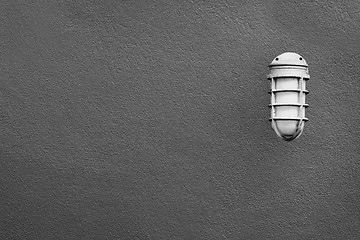 Image showing Simple lantern on the a gray wall