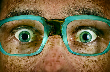 Image showing Frightened look of a man in old glasses