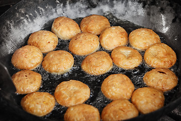 Image showing Indian pastries in a pan on the open market