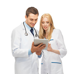 Image showing young doctors working with tablet pc