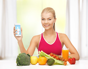 Image showing woman with fruits, vegetables and tablet pc