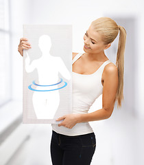 Image showing woman holding picture of dieting woman