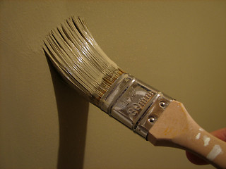 Image showing Paint brush painting a wall