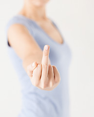 Image showing woman showing middle finger