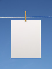 Image showing Blank paper sheet on a clothes line (+2 clipping paths)