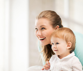 Image showing happy mother with adorable baby