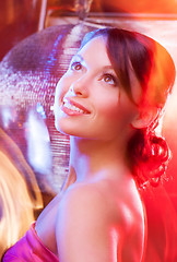 Image showing woman with disco ball