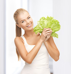 Image showing woman holding lettuce