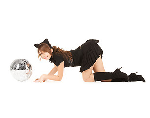 Image showing girl in cat costume with glitter ball