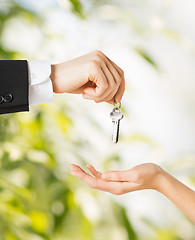 Image showing man and woman with house keys