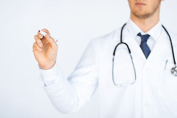 Image showing doctor writing something in the air