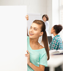 Image showing woman with white blank board at school