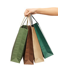 Image showing woman hands holding shopping bags