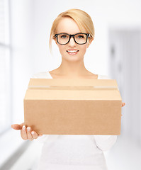 Image showing woman with cardboard box