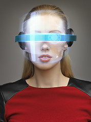 Image showing attractive woman with digital glasses