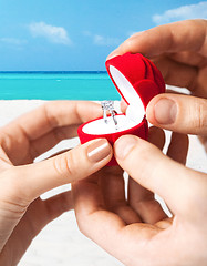 Image showing couple with wedding ring and gift box