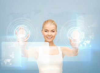 Image showing woman working with virtual screen