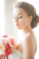 Image showing bride with bouquet of flowers