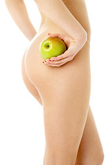 Image showing naked woman with green apple