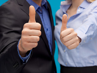 Image showing business team showign thumbs up