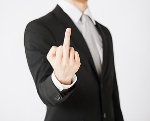 Image showing man showing middle finger