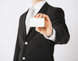 Image showing man hand with blank paper