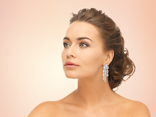 Image showing woman wearing shiny diamond earrings