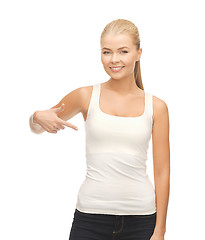 Image showing woman in blank white t-shirt pointing at herself